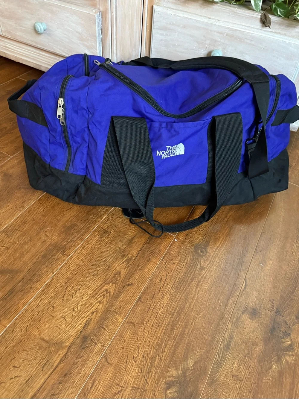 The North Face Purple and Black Duffel Bag